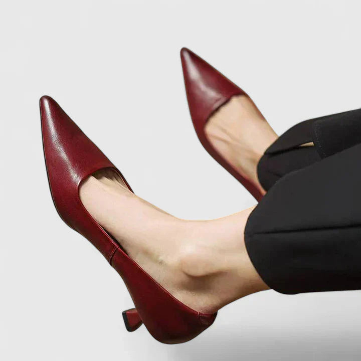 A woman in balanced comfort heels moving from the office to an evening reception.