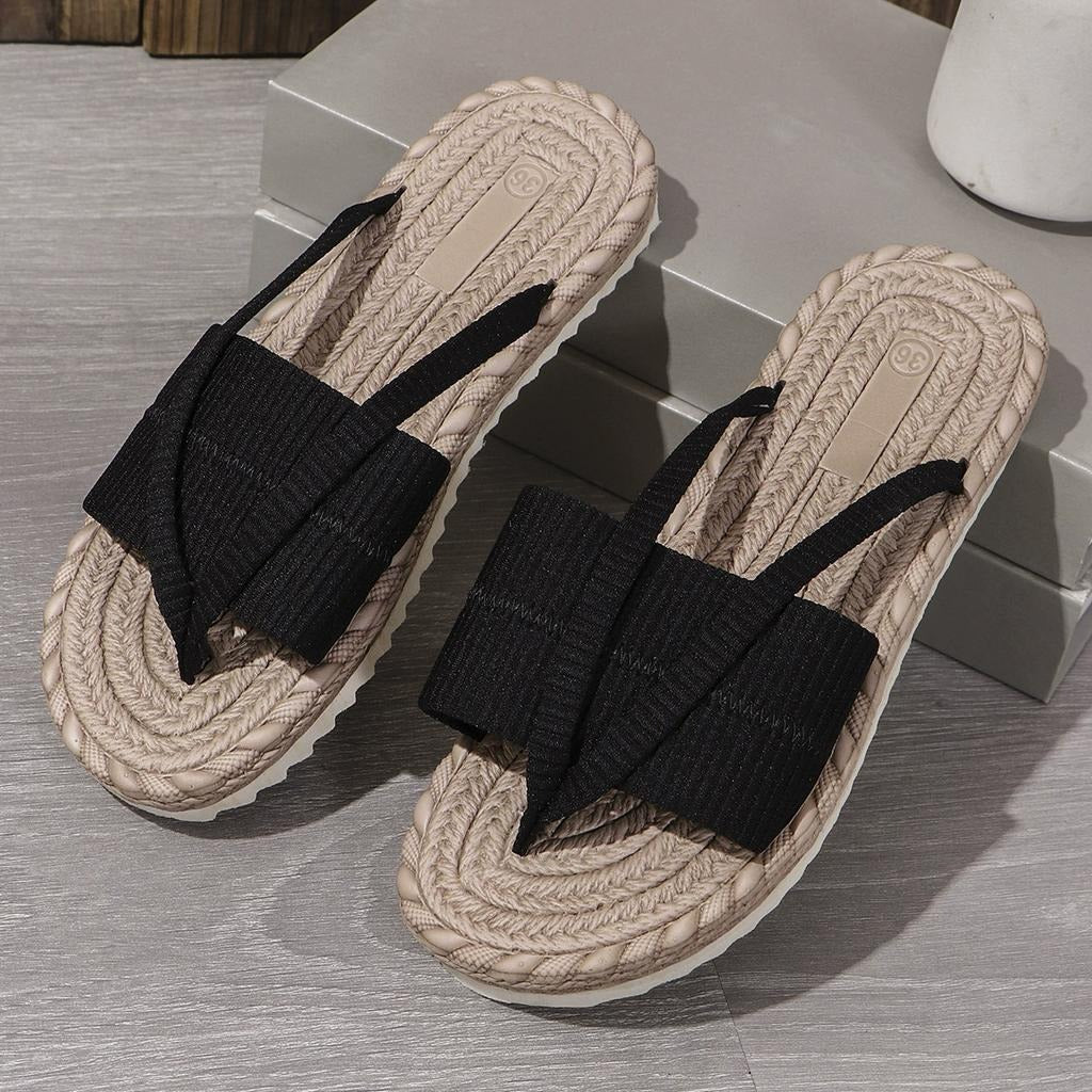 Flat crossover strap sandals in mint green with a simple, open toe-post design