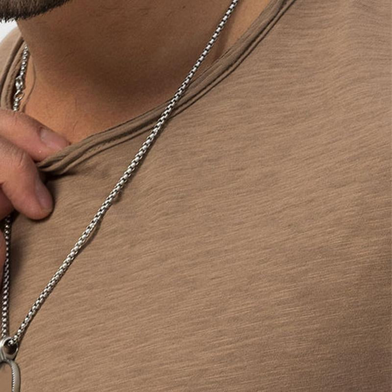 Men's plain long-sleeve crew neck top in a classic solid colour