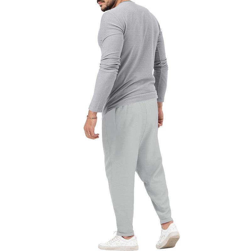 Men's matching Henley long-sleeve top and trousers set in a solid colour