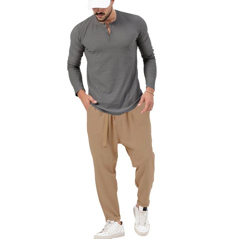 Men's matching Henley long-sleeve top and trousers set in a solid colour