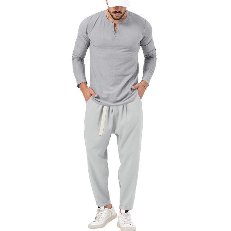 Men's matching Henley long-sleeve top and trousers set in a solid colour
