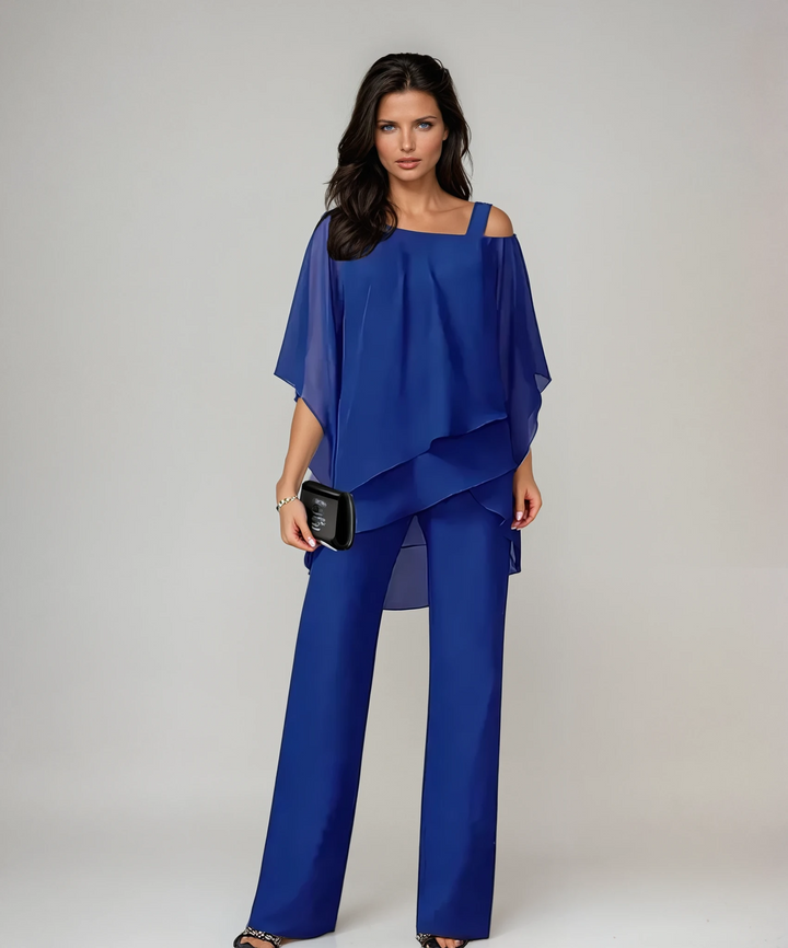 Elegant two-piece set in white with a floaty asymmetric top and wide-leg trousers