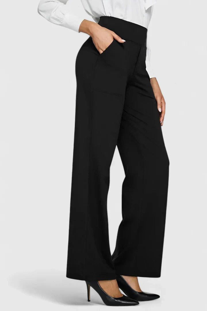 A woman in elegant straight-leg trousers with pockets, styled for a polished everyday look.