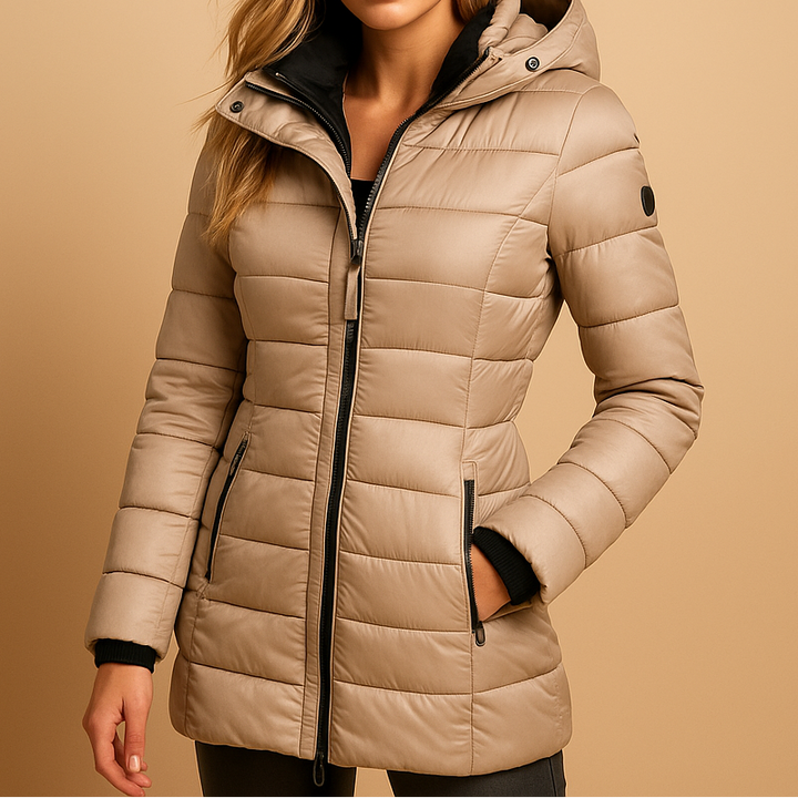 A woman wearing a lightweight puffer jacket, standing outdoors on a cool day
