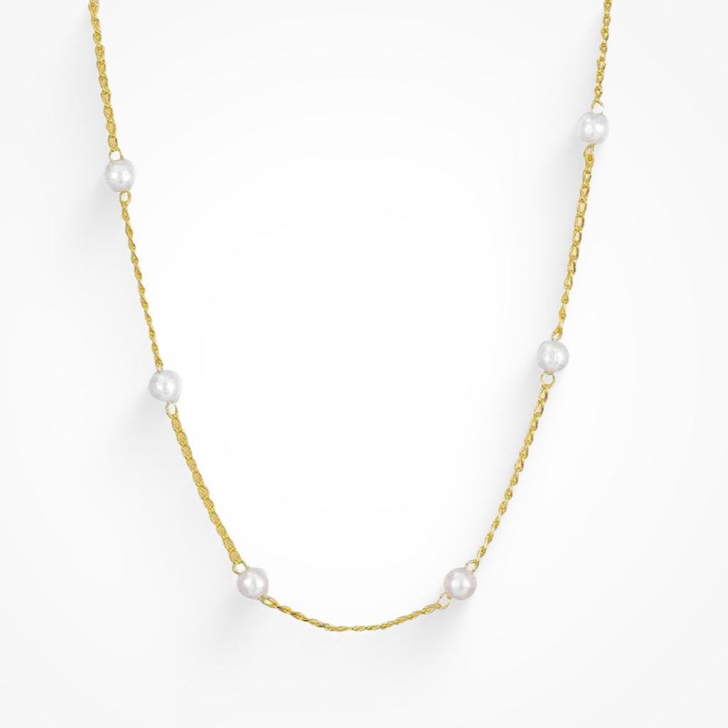 Gold initial letter pendant necklace on fine polished chain