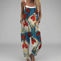 Creative printed salopette-style jumpsuit with wide legs and adjustable shoulder straps