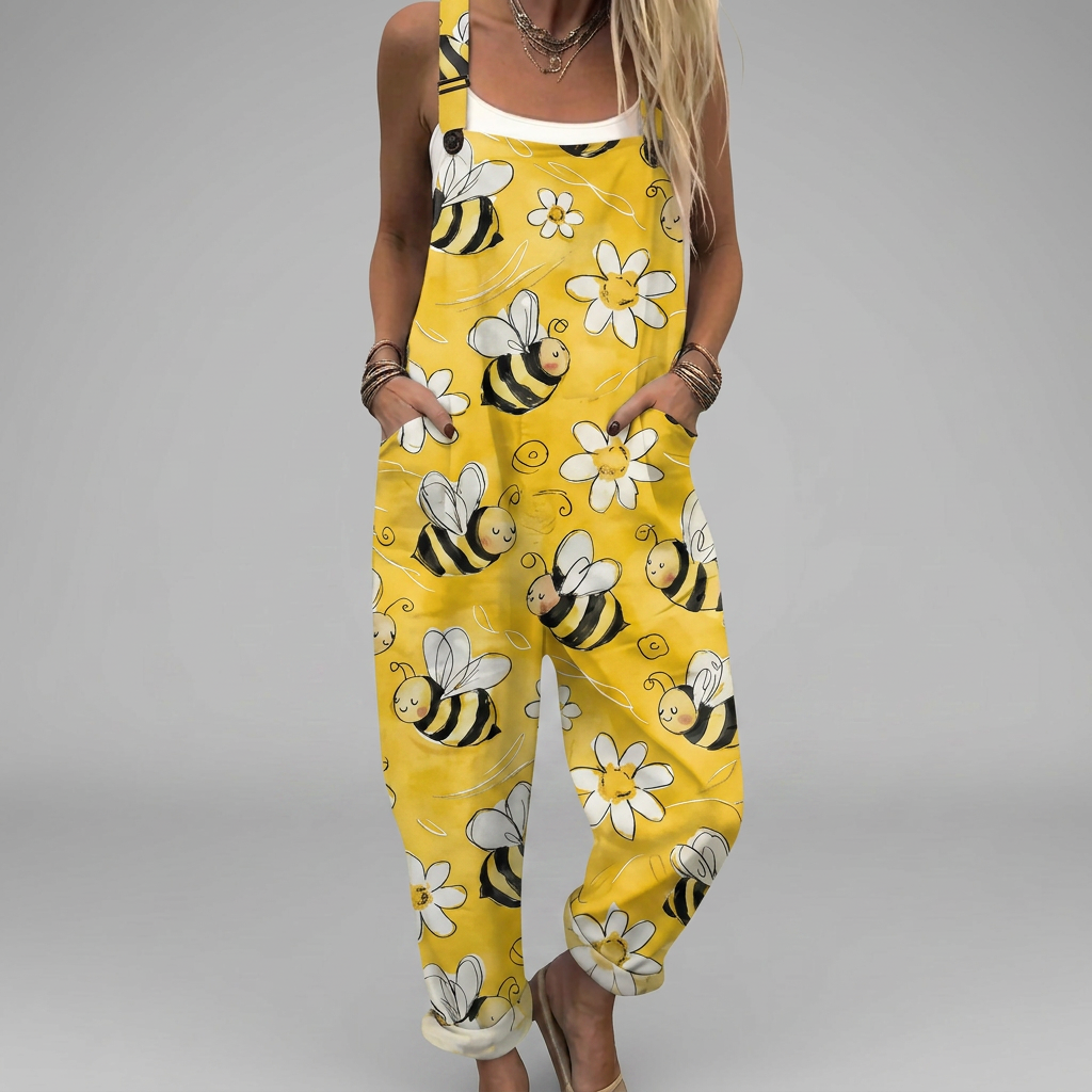 Wide-leg printed jumpsuit with flowing trousers and adjustable straps in a relaxed silhouette
