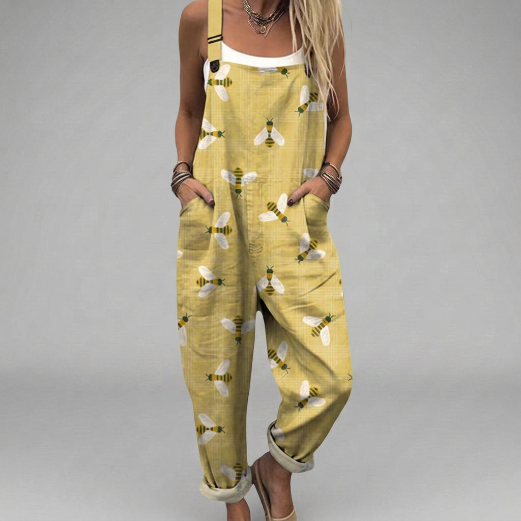 Printed wide-leg salopette jumpsuit with elegant flowing silhouette and adjustable straps