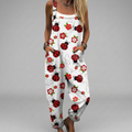 Wide-leg printed jumpsuit with flowing trouser legs and adjustable straps in an elegant silhouette