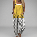 Flowing printed wide-leg salopette jumpsuit with adjustable straps and an elegant, relaxed silhouette