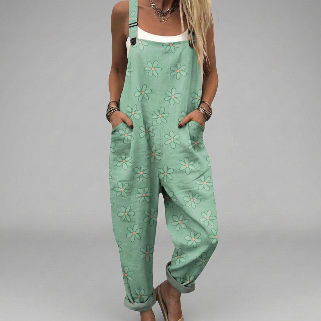 Natural-toned printed wide-leg jumpsuit with a soft, flowing drape and adjustable straps