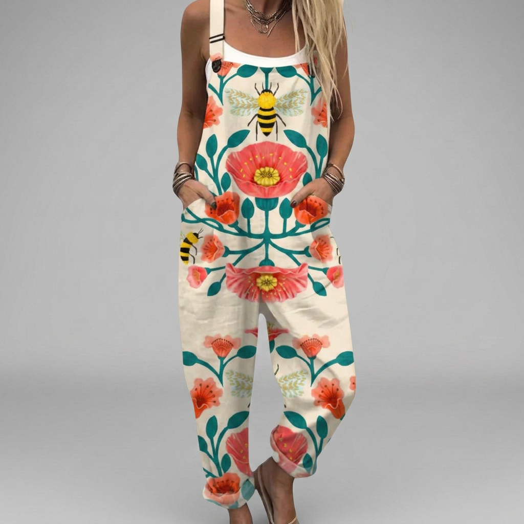 Wide-leg floaty printed jumpsuit with adjustable straps and a relaxed flowing silhouette
