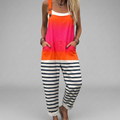 Wide-leg print jumpsuit with adjustable straps and a smooth flowing drape in a vibrant summer print
