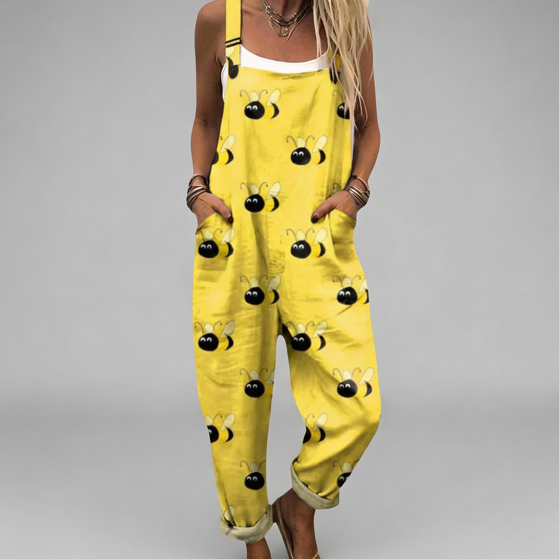 Wide-leg printed jumpsuit with a floaty, elegant silhouette and adjustable straps