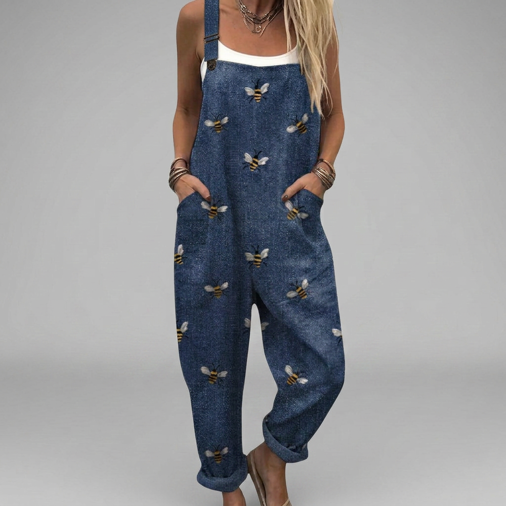 Elegant printed wide-leg jumpsuit with a smooth, flowing drape and adjustable shoulder straps
