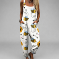 Elegant printed wide-leg jumpsuit with flowing trousers and adjustable shoulder straps