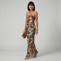 Geometric multicolour scale print halter neck maxi dress with a sleek fitted silhouette