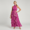 Pink halter maxi dress with a ruched bodice and cascading layered ruffle skirt