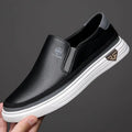 Men's slip-on loafer in black with a smooth structured upper and clean sole