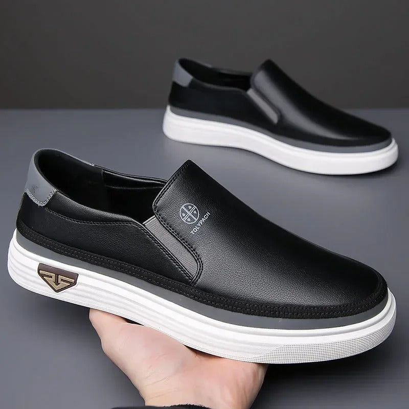 Men's slip-on loafer in black with a smooth structured upper and clean sole
