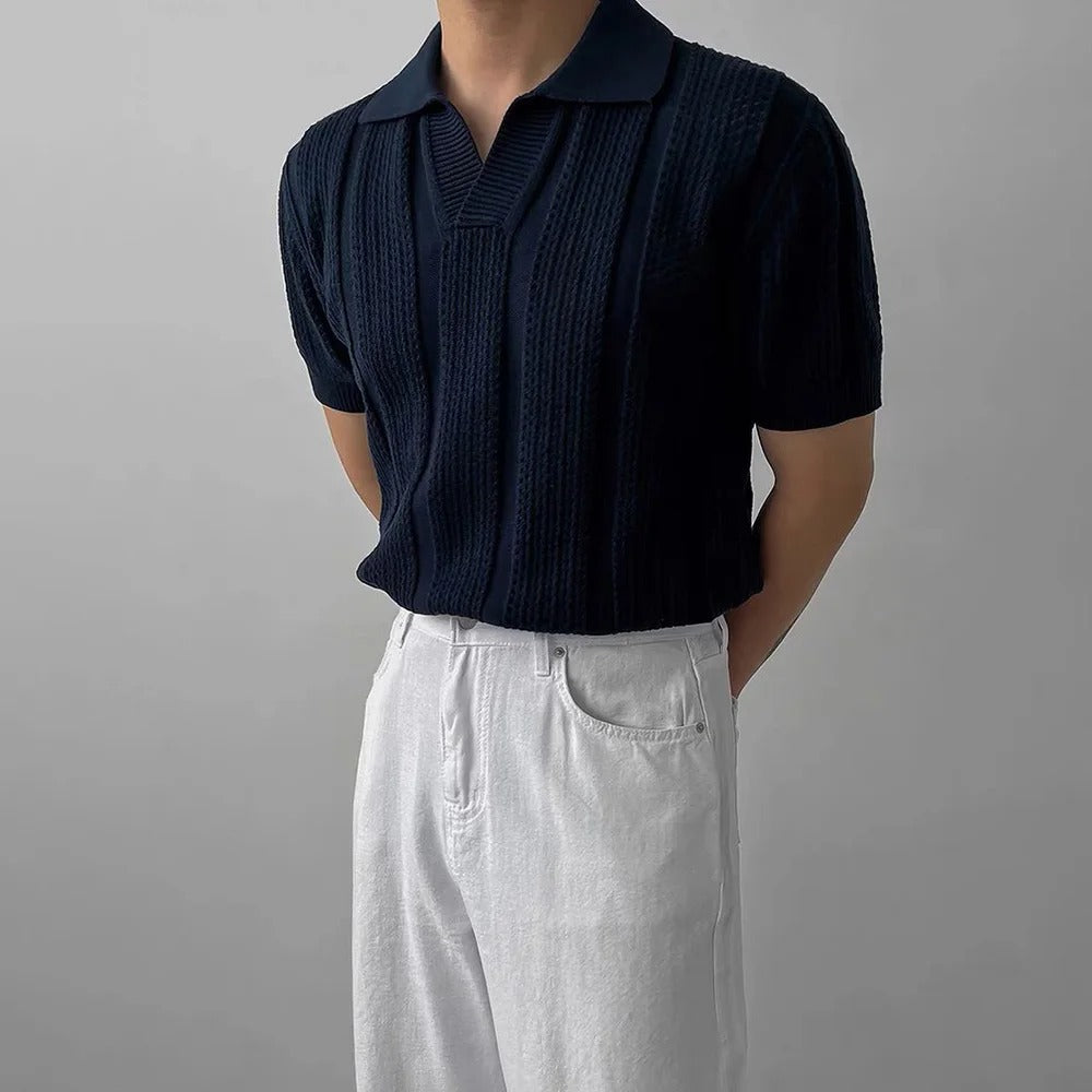 Men's textured heritage polo shirt in navy with a clean, structured silhouette