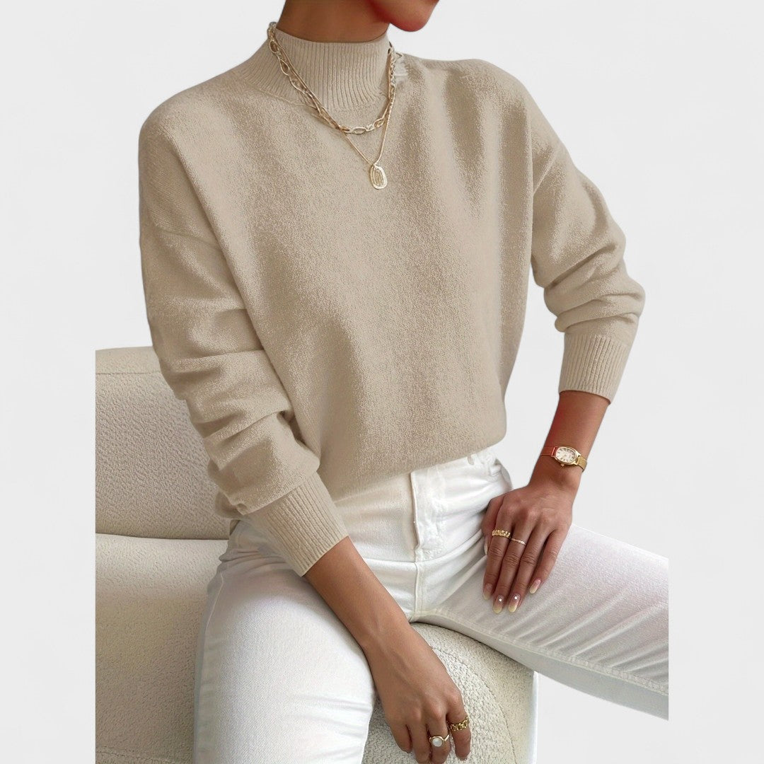 Soft roll-neck jumper in a close, elegant fit available in white, black and pastel shades
