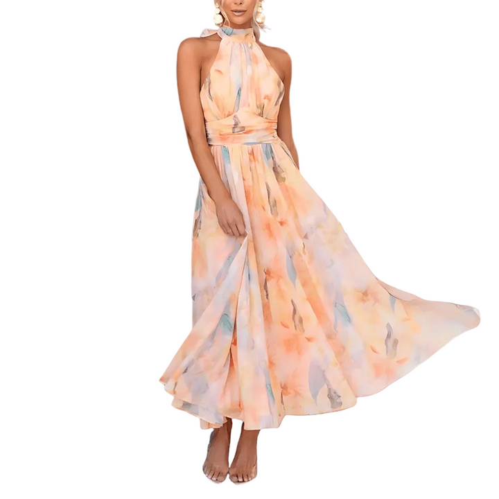 Floaty pastel midi dress with a soft flowing silhouette and warm feminine colour tones