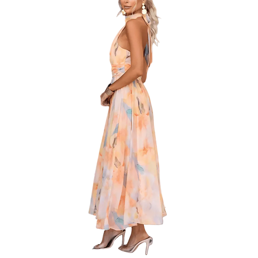 Floaty pastel midi dress with a soft flowing silhouette and warm feminine colour tones