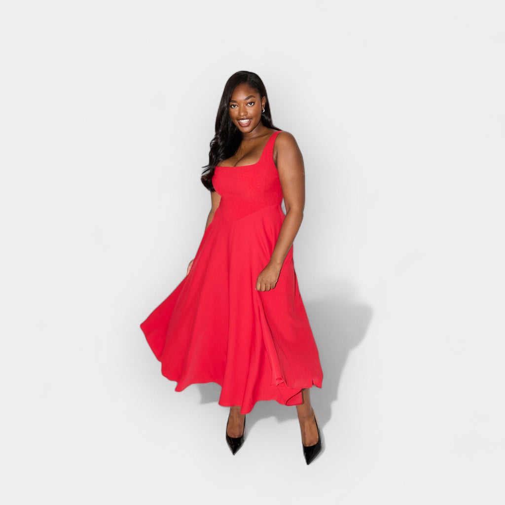 Elegant white midi A-line dress with a square neckline and flowing feminine skirt