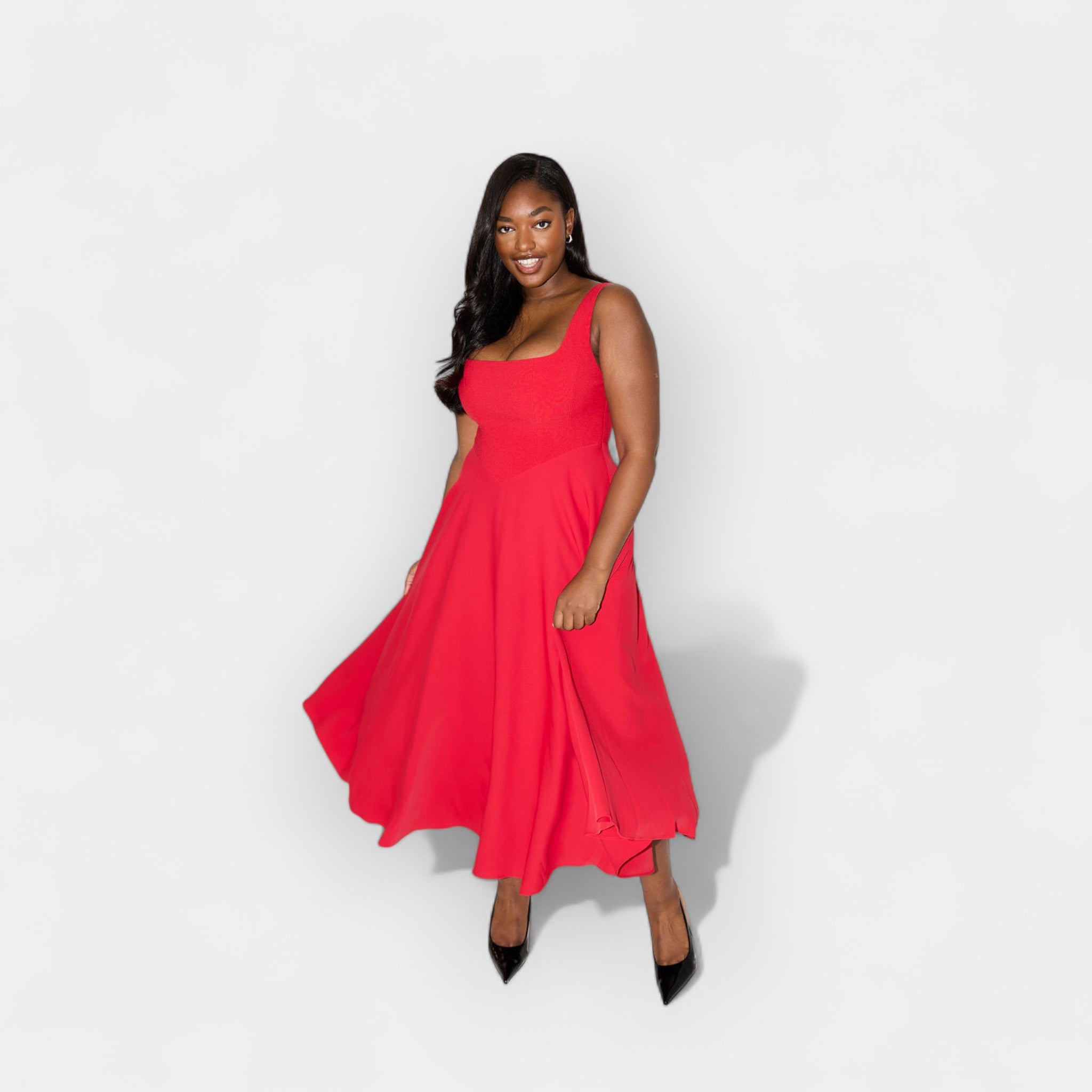 Elegant white midi A-line dress with a square neckline and flowing feminine skirt