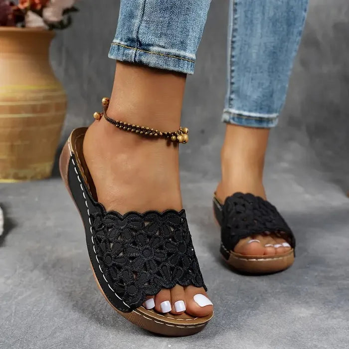 Blue scalloped wedge sandals with open design and cushioned base