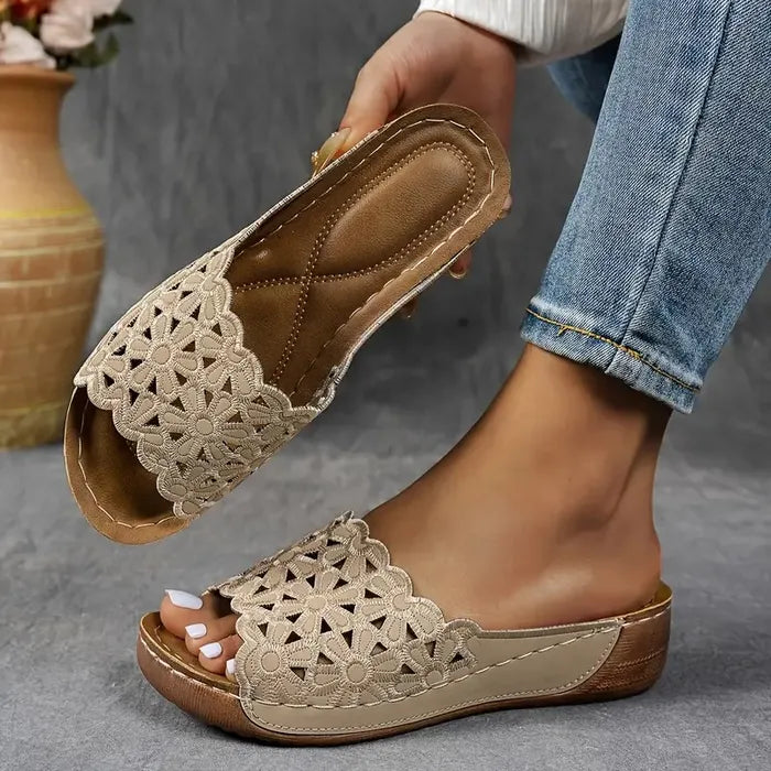 Blue scalloped wedge sandals with open design and cushioned base