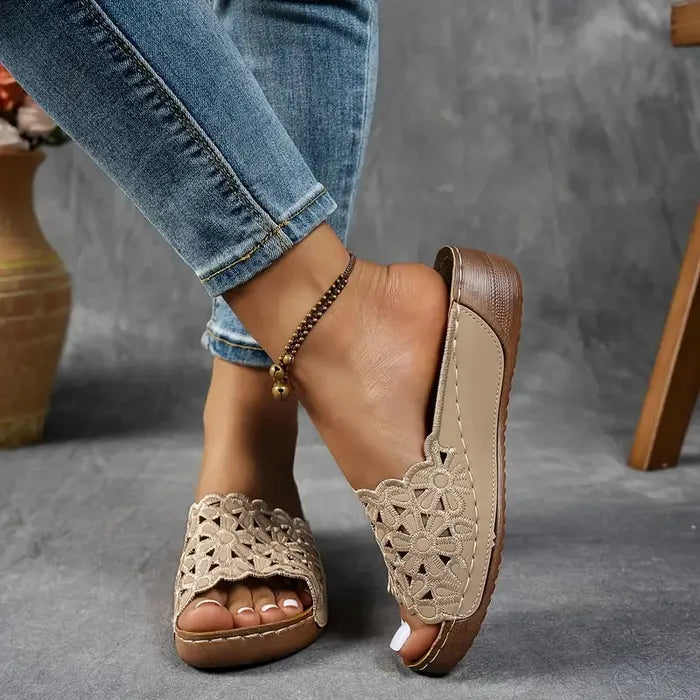 Blue scalloped wedge sandals with open design and cushioned base