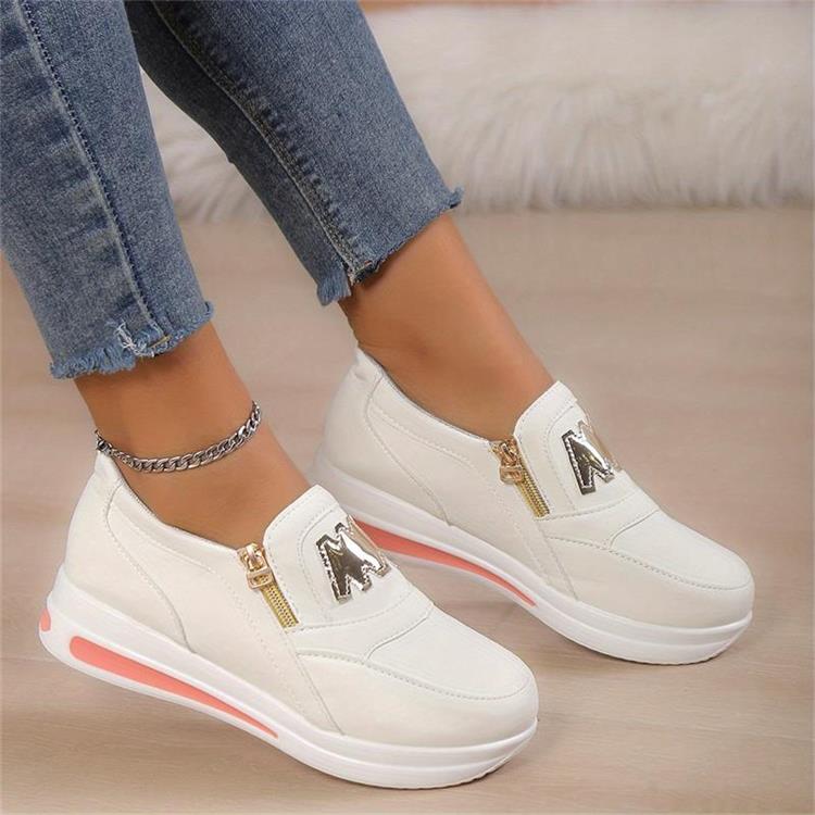 Women's black comfort slip-on shoes with a cushioned ergonomic sole and clean minimal design