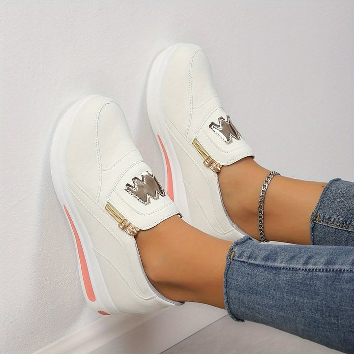 Women's black comfort slip-on shoes with a cushioned ergonomic sole and clean minimal design