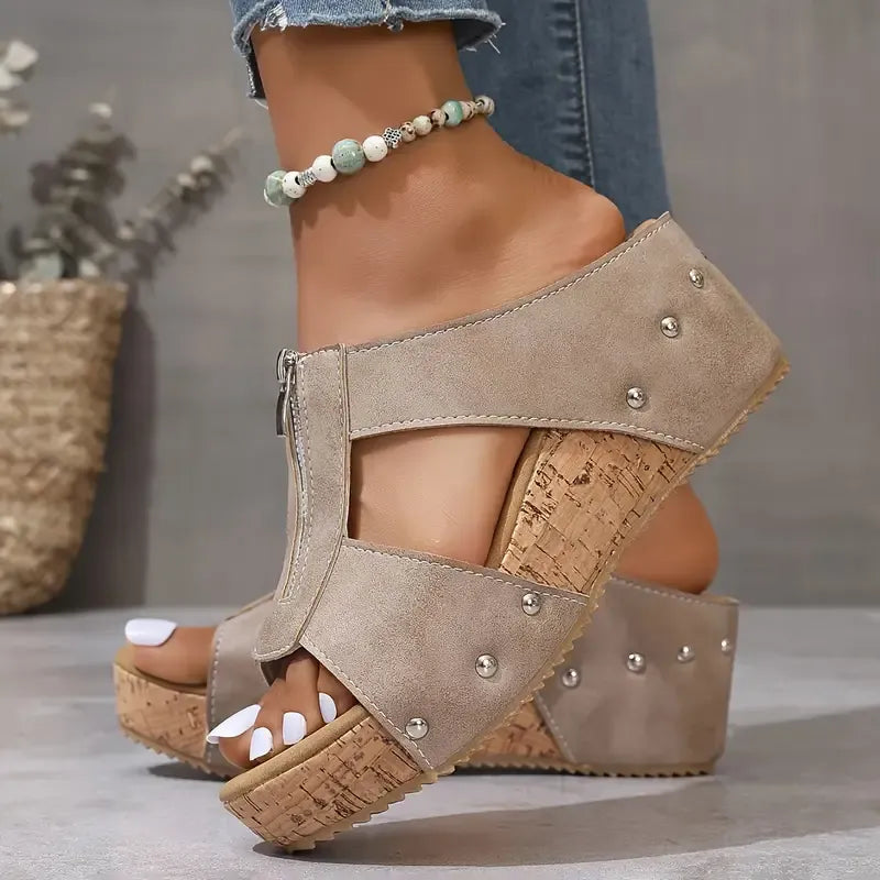 Black wedge sandals with side zip fastening and open design
