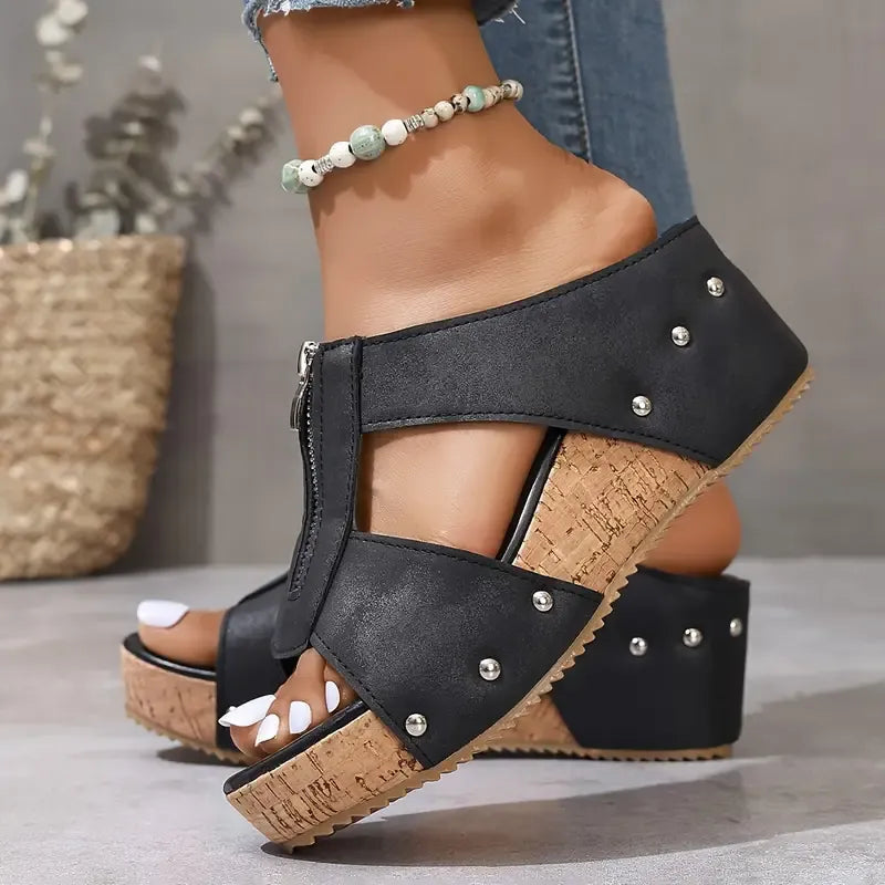 Black wedge sandals with side zip fastening and open design