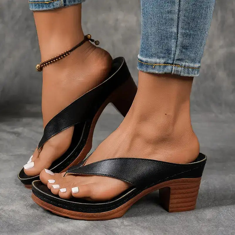 Heeled toe-post sandals with a wide block heel in black, champagne, white and brown