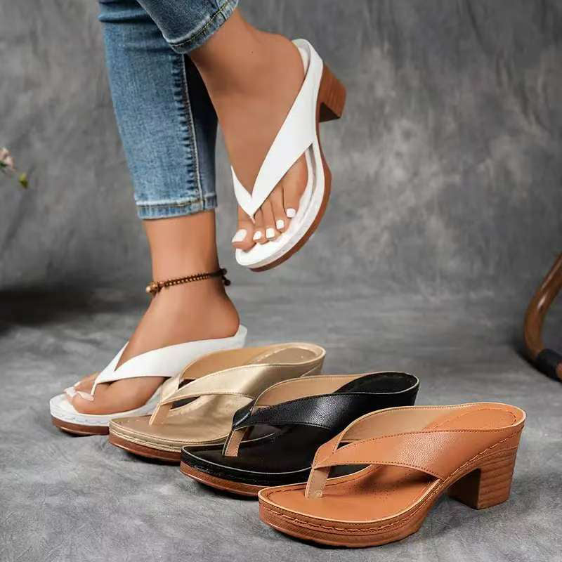Heeled toe-post sandals with a wide block heel in black, champagne, white and brown