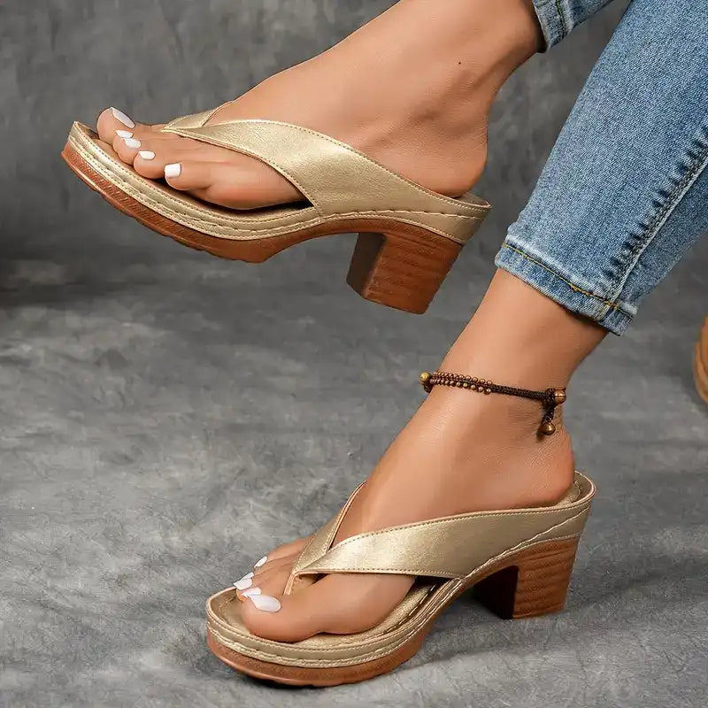 Heeled toe-post sandals with a wide block heel in black, champagne, white and brown