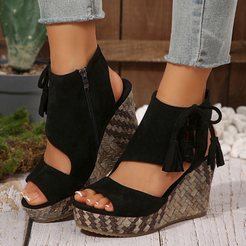 Boho wedge sandals in khaki with a trailing fringe detail at the back
