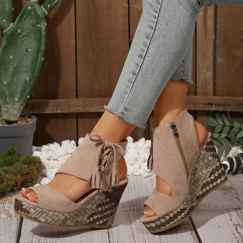 Boho wedge sandals in khaki with a trailing fringe detail at the back
