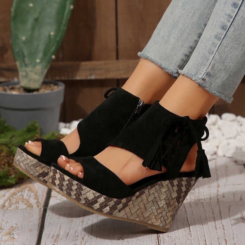 Boho wedge sandals in khaki with a trailing fringe detail at the back