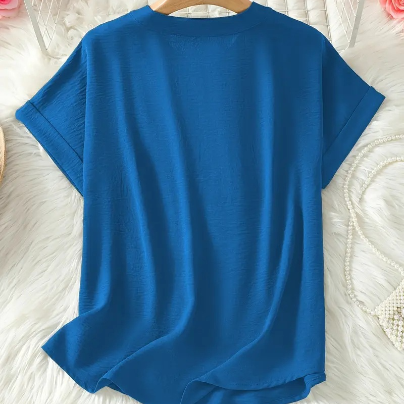 Women's casual navy V-neck blouse with a loose, flowing silhouette