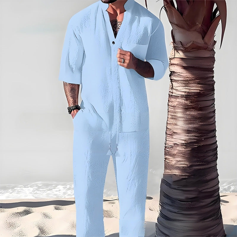 Men's coastal two-piece matching set in navy with a relaxed wide-leg cut and textured finish