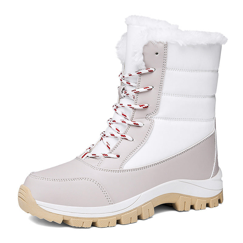 Women's winter insulated boots in red with a sturdy sole and warm lining