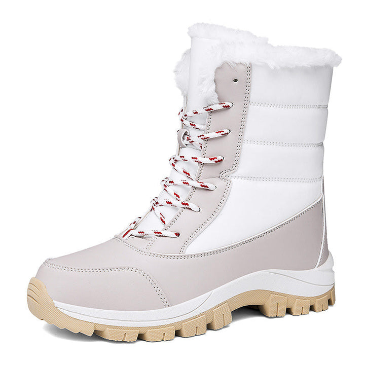 Women's winter insulated boots in red with a sturdy sole and warm lining