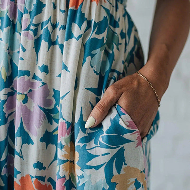 Light, floaty summer dress with an elasticated upper and airy skirt in a soft, feminine style
