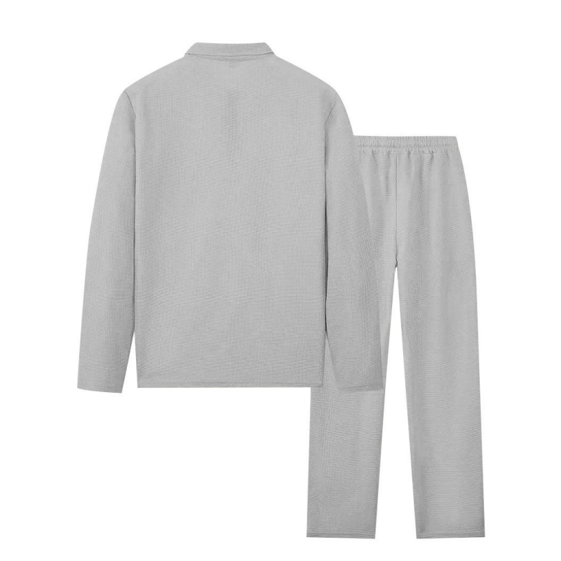 Men's lounge two-piece set in beige with a half-zip top and straight-leg trousers